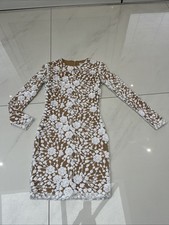 Nadine Merabi White & Nude